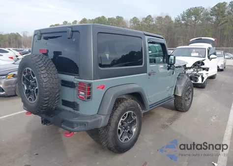 2014 Jeep Wrangler Rubicon z USA, uszkodzony, nr VIN 1C4HJWCG8EL263225